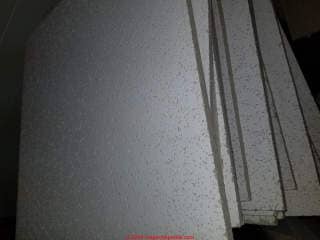 Possible asbestos ceiling tiles (C) InspectApedia.com Laura Bolton