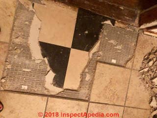 Ceramic tile over vinyl asbestos floor tile (C) Inspectapedia.com Kira