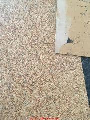 9x9 cork pattern vinyl floor tiles probably contain asbestos (C) InspectApedia.com John