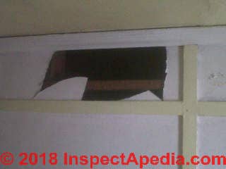 Damaged ceiling may contain asbestos (C) InspectApedia.com Anon