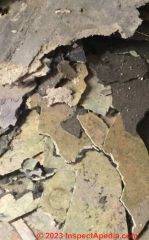 broken up flooring mess (C) InspectApedia.com 