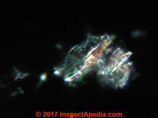 Johnson's Baby Powder Talc at 1200x in polarized light (C) Daniel Friedman InspectApedia.com