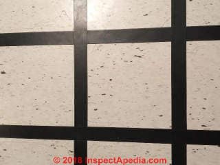 Asbestos suspect floor tile in a 1958 home (C) Inspectapedia.com Ashley