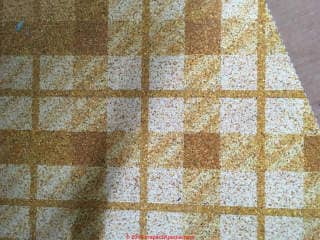 Plaid pattern sheet flooring 1978 may contain asbestos (C) InspectApedia.com Mary