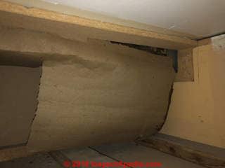 Tan paper duct wrap might contain asbestos (C) Inspectapedia.com Ed