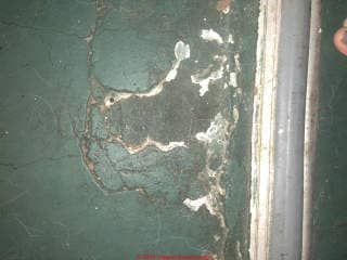 Damaged asphalt asbestos floor tiles (C) InspectApedia.com reader