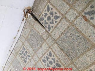 Asbestos suspect vinyl flooring (C) InspectApedia.com Betty