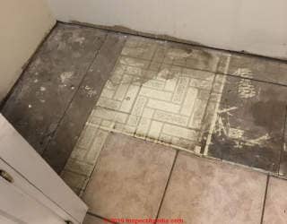 White brick pattern Asbestos-suspect vinyl flooring (C) InspectApedia.com 