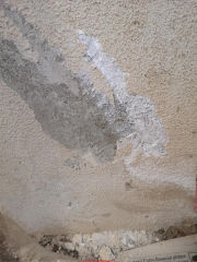Effloresence salts on stucco not asbestos (C) InspectApedia.com Ontario Canada home