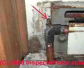 Manual air bleed valve on a heating baseboard (C) Daniel Friedman