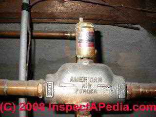 Air scoop and air purge valve atop a heating boiler (C) Daniel Friedman