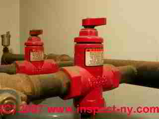 Check valve on heat (C) Daniel Friedman at InspectApedia.com