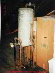 Attic pressure tank for heating systems