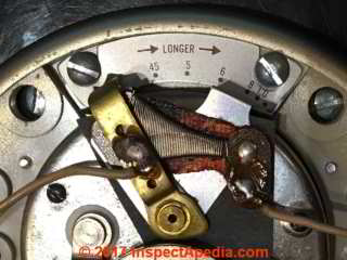 Heat anticipator details on a Honeywell T832A Day-Night mechanical setback thermostat (C) InspectApedia.com HR