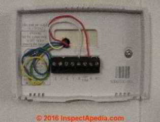 Thermostsat labeling and wires confirm 24Volts not 120Volts or 240 Volts. (C) Daniel Friedman