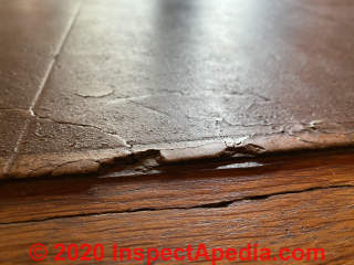9x9 Cork-like floor tiles for identification (C) InspectApedia.com  L.Low.