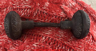 Antique doorknob, possibly cast iron (C) InspectApedia.com Goose
