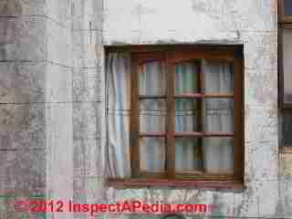 Rusted out steel glider slider window (C) Daniel Friedman