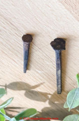 Hand forged antique nail with irregular head - age (C) InspectApedia.com Amy