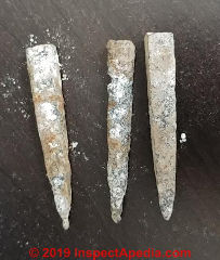 Antique headless nail, probably a sprig nail (C) InspectApedia.com Angie