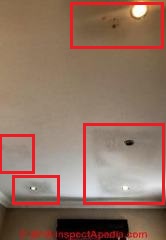 Dark rectangular stains around recessed lights - (C) InspectApedia.com
