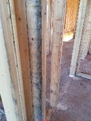 Cosmetic mold on wood framing in a new home (C) InspectApedia.com Ariel