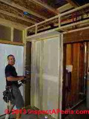 Plumbing chase after foam insulation (C) Daniel Friedman Eric Galow Galow Homes