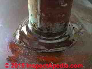 Epoxy sealant stops seepage at oil tank fill and vent piping (C) Daniel Friedman