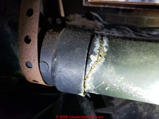 Cracked black ABS plastic pipe in a Virginia home (C) InspectApedialcom John Cranor