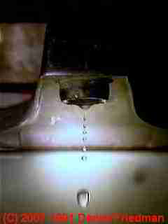 Dripping water at a faucet (C) Daniel Friedman
