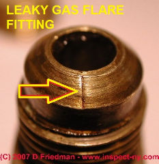 Photograph of a leaky brass flare fitting