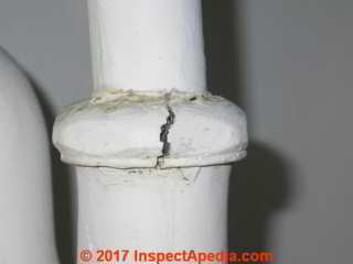Cracked plumbing interceptor trap nut causes leaks (C) Daniel Friedman InspectApedia.com