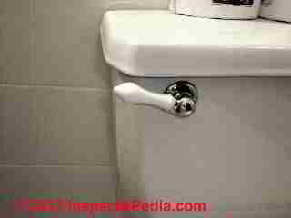 Side valve flush lever toilet © D Friedman at InspectApedia.com 