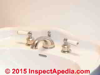 Jumper valves or sink faucets in a New York home (C) Daniel Friedman