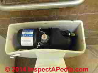 Sloan Flushmate power flush toilet tank & controls (C) Daniel Friedman