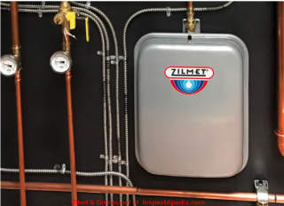 Flat wall-hung thermnal expansion tank from Zilmet - cited & discussed at InspectApedia.com