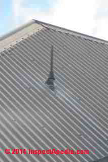 Exposed metal fastener roof, Akaroa New Zealand (C) Daniel Friedman
