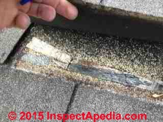 Asphalt shingle cellophane strip in the wrong place (C) A Kester InspectApedia.com
