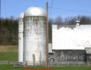Metal roof blow off at the Frank Brothers dairy barn on Route 44 in Poughkeepsie New York  (C) Daniel Friedman at InspectApedia.com