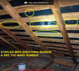 Too many staples may damage wood shakes or shingles and these also miss the skip sheathing boards (C) InspectPedia.com