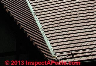 Clay tile roof flashing at roof valley (C) Daniel Friedman