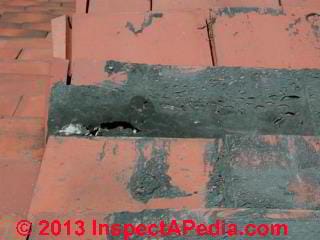 Flashing cement patch failure on a clay tile roof (C) Daniel Friedman