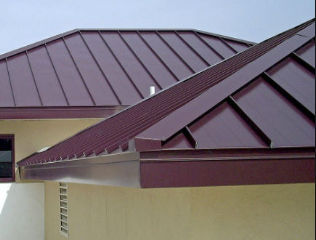 Standing seam metal roof vents using Emseal tape - at InspectApedia.com