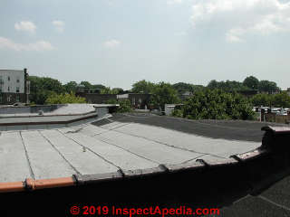 Examples of defects & mistakes in roll roofing installations (C) InspectApedia.com Daniel Friedman