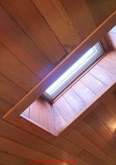 Skylight leak from inadequate roof repair (C) InspectApedia.com Karl