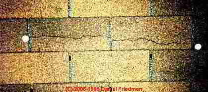 example of thermal splitting on fiberglass-based asphalt roof shingles DF