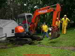 Photograph of septic drain line excavation in process.