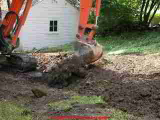 Photograph of backfilling the sewer line trench