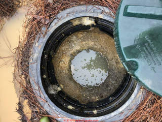Flooding aerobic septic tanks (C) InspectApedia.com WeeksJ
