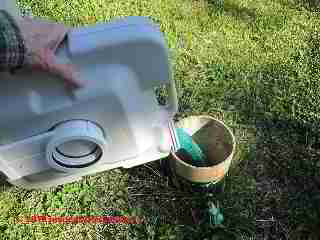 Chemical toilet being emptied into a septic tank (C) Daniel Friedman